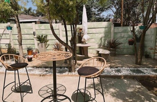 Newcastle House | Contemporary Gem: Studio with Serene Pool Viewn