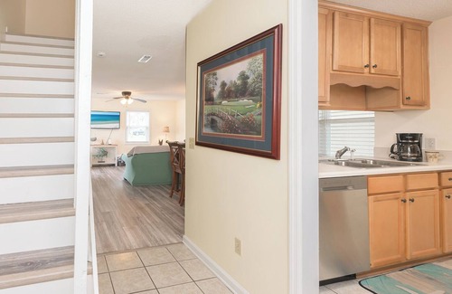 West Panama City Beach House | Convenience - Dedicated covered parking at entrance to unit, steps from beach