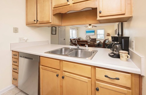 West Panama City Beach House | Convenience - Dedicated covered parking at entrance to unit, steps from beach