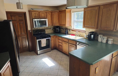 Seven Hills House | Convenient to airport, downtown, & parks.
