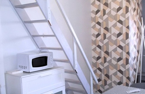 Lens Apartment | Cook 1