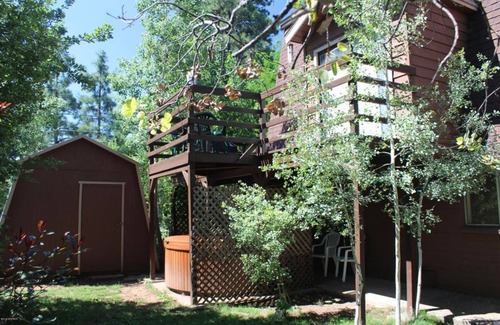 Mountainaire House | Cool Down in Mountainaire Manor > Hot Tub in the Pines w/Movie Theater