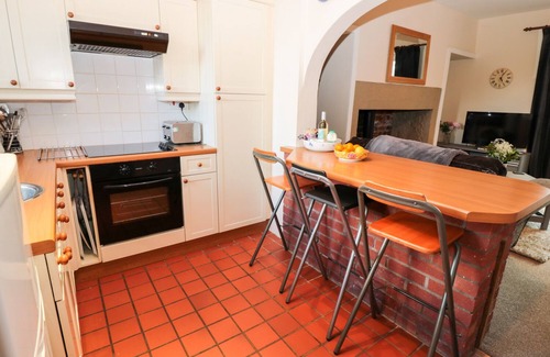 Berwick-upon-Tweed Cottage | CORBETT COTTAGE, pet friendly, with open fire in Holy Island