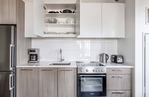 MIT Apartment | Corner Kendall Sq 1BR w/Office Nook, Gym near MIT by Blueground