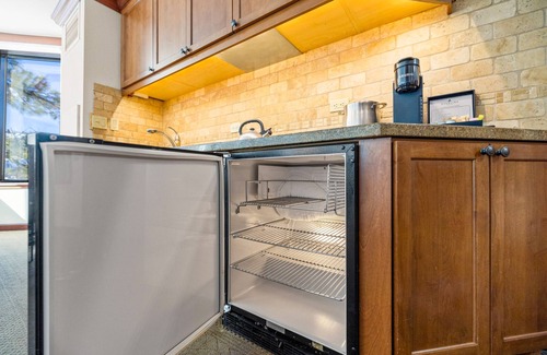 Olympic Valley Condo | Corner king suite with Valley-view, pool, hot tub, golf & other resort amm.