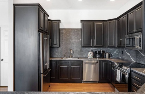 Downtown Louisville Condo | Corner Penthouse at the Historic Levy Building