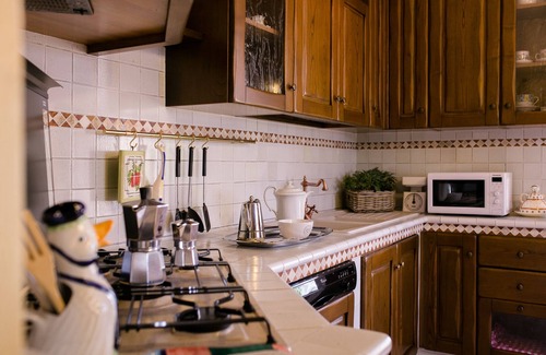 Cortona Villa | Corte della Luna, elegant villa with swimming pool surrounded by a suggestive olive grove