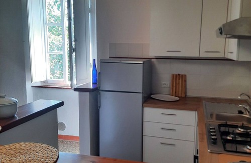 Rosignano Marittimo Villa | Cosy apartment in villa for 10 guests with pool, TV and pets allowed