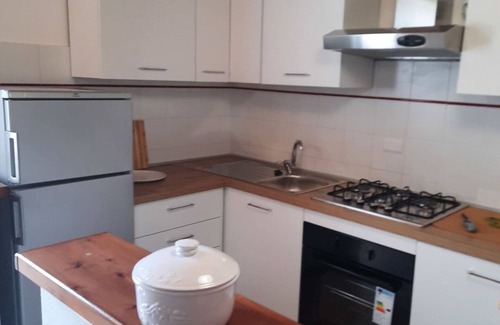 Rosignano Marittimo Villa | Cosy apartment in villa for 10 guests with pool, TV and pets allowed