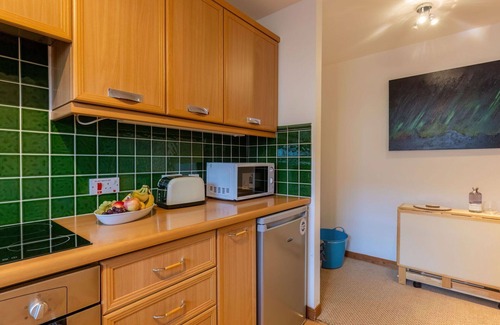 South Galson Apartment | Cosy apartment for 4 guests with TV and terrace