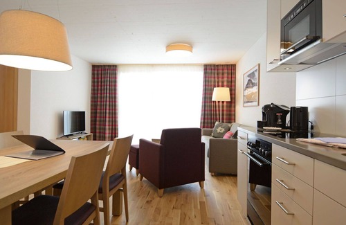 Tavanasa Apartment | Cosy apartment for 4 guests with WIFI, pool, hot tub, TV, patio and panoramic view