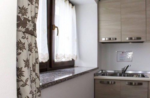 Ovaro Apartment | Cosy apartment for 4 people with WIFI, TV, patio and pets allowed