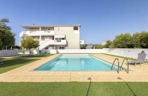 La Muddizza Apartment | Cosy apartment for 5 people with WIFI, A/C, pool, TV and terrace