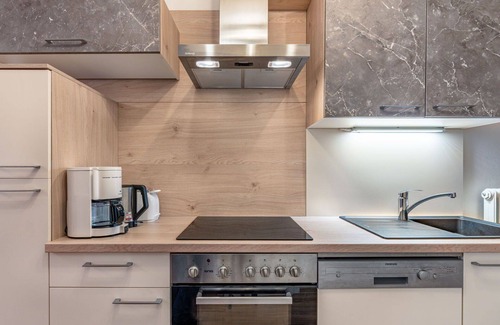 Arriach Villa | Cosy apartment in villa for 9 guests with WIFI, TV and patio