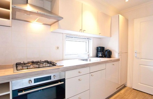 Schaarsbergen House | Cosy apartment in villa for 4 guests with WIFI, pool, TV and terrace