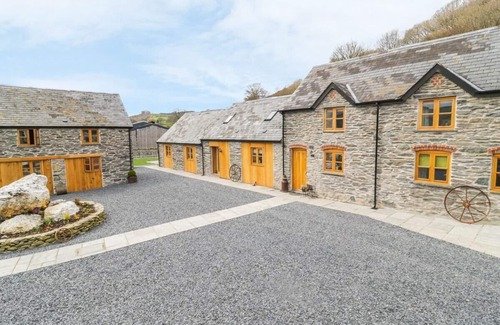 Corwen House | Cosy Barn - Sleeps 8, Hot Tub & Countryside Views