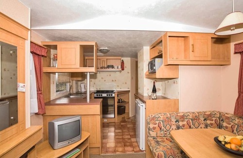 Sandown House | Cosy caravan with one double and one twin.