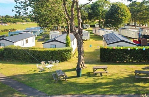 Sandown House | Cosy caravan with one double and one twin.