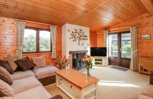 New Forest District Cabin | Cosy Log Cabin - very quiet part of Shorefields Park near Fishing Lake