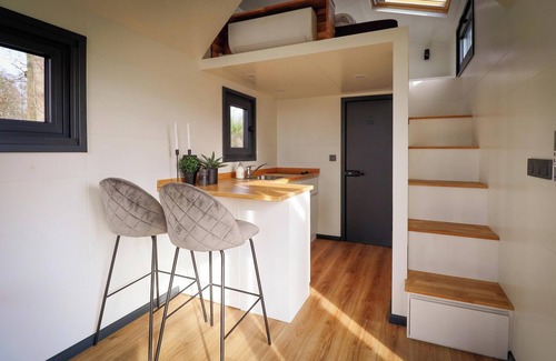 Nieuw Heeten House | Cosy Tiny House for 2 guests with sleeping loft, skylight and veranda in the Sallandse Heuvelrug.