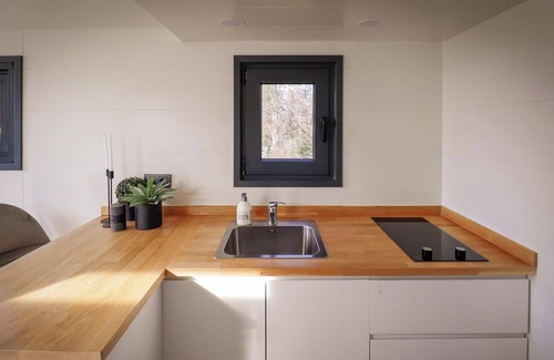 Nieuw Heeten House | Cosy Tiny House for 2 guests with sleeping loft, skylight and veranda in the Sallandse Heuvelrug.