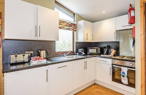 Millom Ski Chalet | Cosy traditional lodge with one double and one twin.