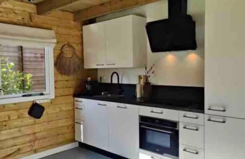 Zon en Schild House | Cosy wooden house with hot tub in forest