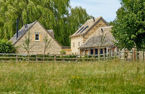 Ampney Crucis House | Cotswolds One Bedroom Barn Conversion near Bibury with private garden & terrace