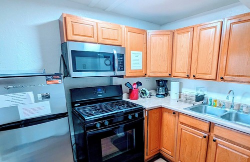 The Village Cottage | Cottage 5: Charming cottage with full kitchen and AC.