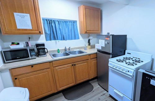 The Village Cottage | Cottage 5: Charming cottage with full kitchen and AC.