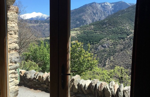 Canaveilles House | Cottage built into rock face, with spectacular mountain views of the Pyrenees