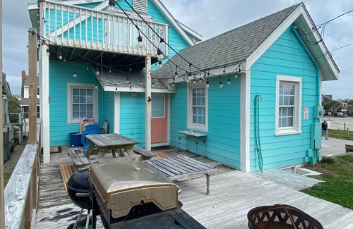 Atlantic Beach Cottage | Cottage in the heart of Atlantic Beach with ocean views, two decks, WiFi, & W/D