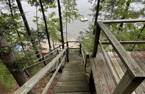 Standish Cottage | Cottage nestled in the woods overlooking Sebago Lake.