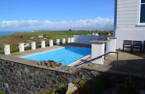 Mullion House | Cottage on coastpath, dogs welcome, includes Hotel indoor pool gym and tennis
