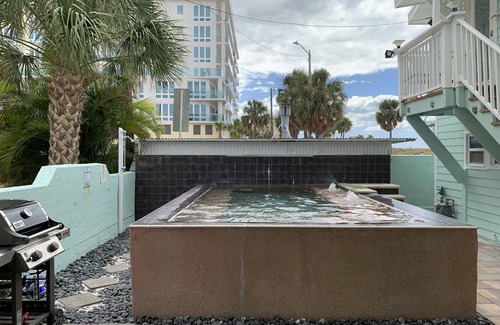 Clearwater Beach Cottage | Cottage on the beach! 30 second walk away! Heated pool on the property!