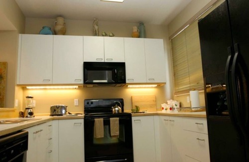 Whitney Beach House | Country Club Long Boat Key Beach Villa 2B 3BA Pool