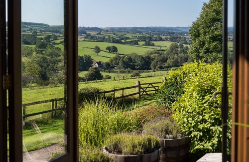 Belluton Cottage | Countryside retreat with stunning views & pool