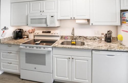 Midtown Ocean City Apartment | Couple's Getaway! Oceanfront Oasis - Corner Balcony, Beach Views, Full Kitchen, Steps to the Sand