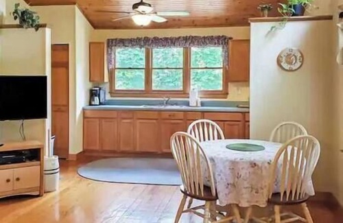 Hot Springs House | Couples Cabin with King bed and outdoor hot tub!