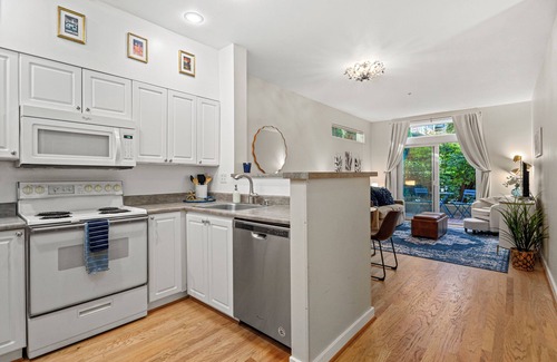 Belltown Condo | Courtyard Garden Oasis! with Pool & Parking
