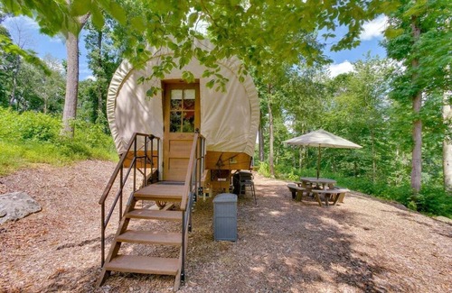 Strasburg RV Rental | Covered Wagon Camping w/Salt Water Hot Tub