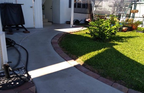 Palmetto House | Cozy 1-bedroom mobile home on rim canal with dock, Palmetto Fla.
