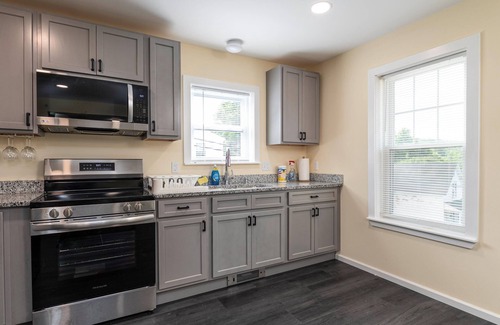 Guild Apartment | Cozy 2-bedroom apt 4 innLakes Region with AC, WiFi, Pet friendly 2 queen beds