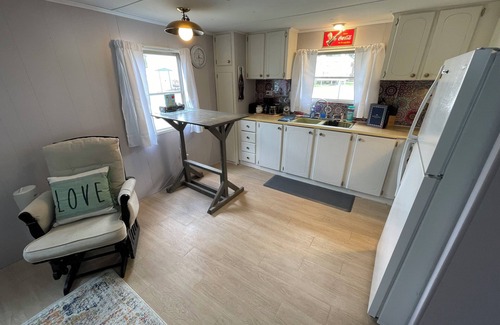 Laketon RV Rental | Cozy 2-bedroom campground in peaceful Claypool with AC, WiFi. Overlooking laken