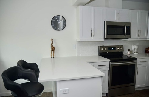 Winnipeg Condo | Cozy 2 story condo short drive to downtown, and Osborne strip!