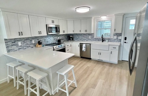 Ocean Isle Beach Cottage | Cozy 5BR-2BA Cottage on Canal, Private Heated Pool, Private Boat Dock