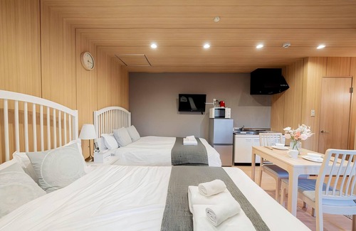 Sonezakishinchi Apartment | Cozy 6 - guest Japanese - themed stay. Great facilities. Private & comfy.