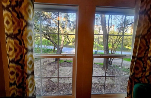 Heritage House | Cozy bungalow in the woods, across from Texas State University!