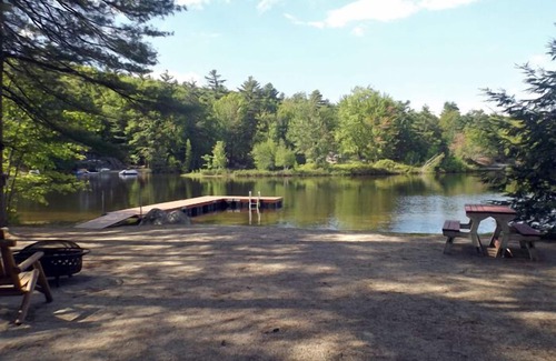 Raymond Cottage | Cozy camp with large sandy beach and excellent views of Little Sebago.