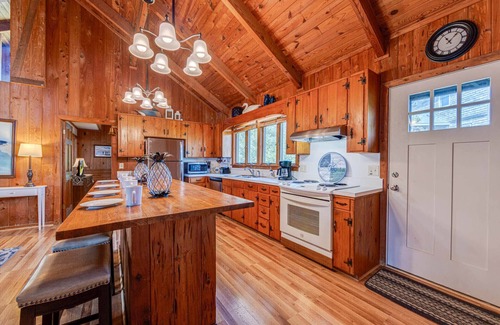 Brigands' Bay House | Cozy Canalfront Cottage w/Hot Tub, Private Boat Dock, Smart TVs, Screened Porch